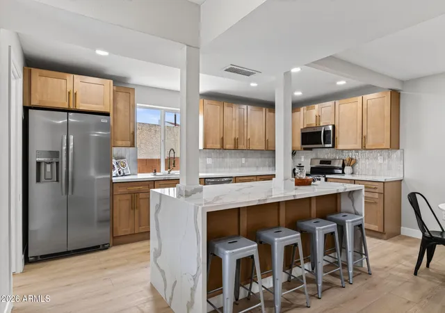 Photo 3 of Townhouse for sale at 1709 E Frier Dr, Phoenix, AZ 85020 | MLS# 7056072 | Listing updated on 2026-09-14