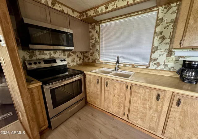Photo 4 of Manufactured home for sale at 10220 E Apache Trl #220, Apache Junction, AZ 85120 | MLS# 7055899 | Listing updated on 2026-10-24