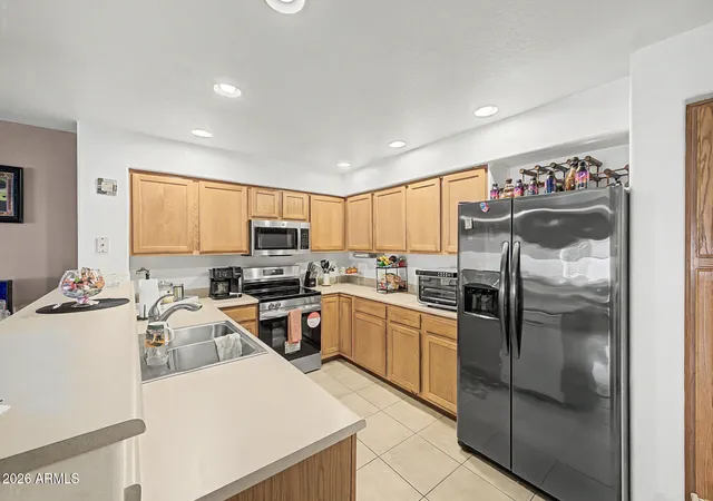 Photo 3 of Townhouse for sale at 8870 N 48th Lane, Glendale, AZ 85302 | MLS# 7057078 | Listing updated on 2026-10-07
