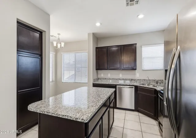 Photo 4 of Townhouse for sale at 1947 N 77th Glen, Phoenix, AZ 85035 | MLS# 7060050 | Listing updated on 2026-09-13