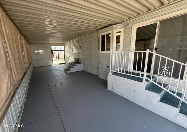 Photo 3 of Manufactured home for sale at 1028 W Pecos Ave, Apache Junction, AZ 85119 | MLS# 7057071 | Listing updated on 2026-08-11