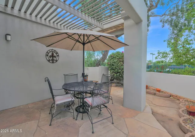 Photo 1 of Townhouse for sale at 7710 E Gainey Ranch Rd #101, Scottsdale, AZ 85258 | MLS# 7058454 | Listing updated on 2026-10-01