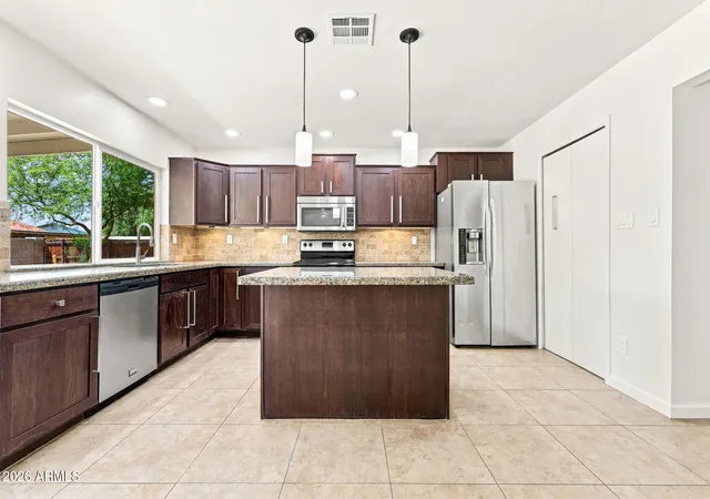 Photo 3 of Single family home for sale at 1041 W Kilarea Ave, Mesa, AZ 85210 | MLS# 7060418 | Listing updated on 2026-09-13