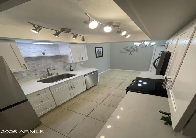 Photo 3 of Townhouse for sale at 629 N Mesa Dr #27, Mesa, AZ 85201 | MLS# 7060675 | Listing updated on 2026-08-25