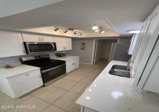 Photo 3 of Townhouse for sale at 629 N Mesa Dr #27, Mesa, AZ 85201 | MLS# 7060675 | Listing updated on 2026-08-25