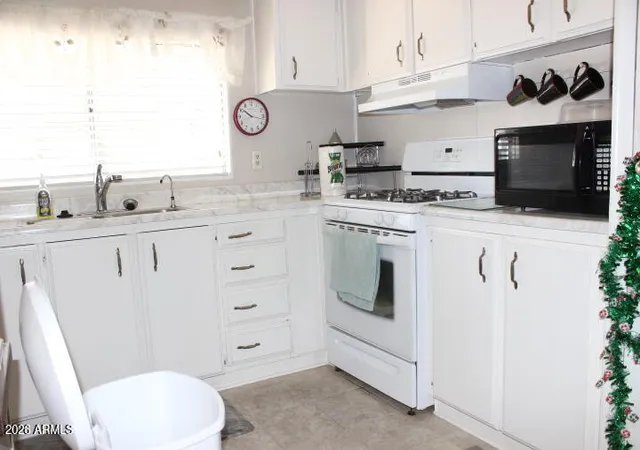 Photo 4 of Manufactured home for sale at 303 S Recker Rd #8, Mesa, AZ 85206 | MLS# 7064553 | Listing updated on 2026-09-16