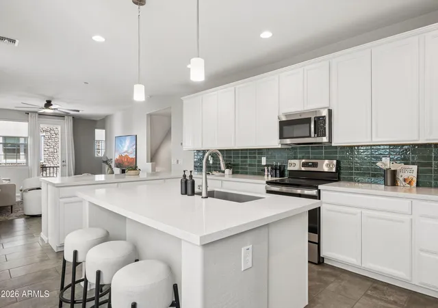Photo 1 of Townhouse for sale at 1676 E Hampton Ln, Gilbert, AZ 85295 | MLS# 7069302 | Listing updated on 2026-10-18