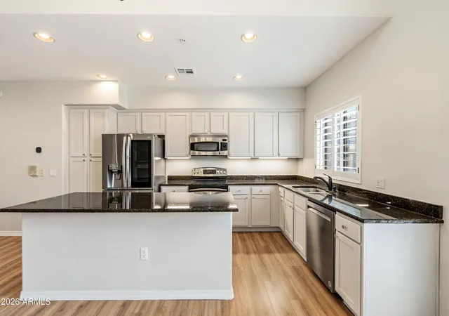 Photo 4 of Townhouse for sale at 3935 E Rough Rider Rd #1034, Phoenix, AZ 85050 | MLS# 7066026 | Listing updated on 2026-10-01