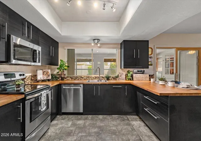 Photo 2 of Single family home for sale at 908 W Laguna Azul Ave, Mesa, AZ 85210 | MLS# 7068170 | Listing updated on 2026-09-07