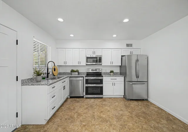 Photo 4 of Single family home for sale at 242 E Heather Ave, Gilbert, AZ 85234 | MLS# 7067637 | Listing updated on 2026-09-04