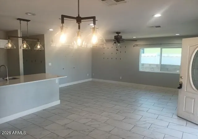 Photo 3 of Single family home for sale at 302 3rd Avenue E, Buckeye, AZ 85326 | MLS# 7067633 | Listing updated on 2026-09-11