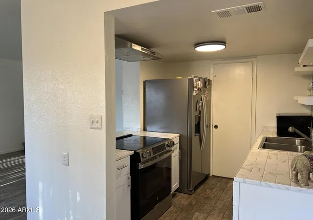 Photo 3 of Townhouse for sale at 4241 N 68Th Dr, Phoenix, AZ 85033 | MLS# 7071330 | Listing updated on 2026-09-08