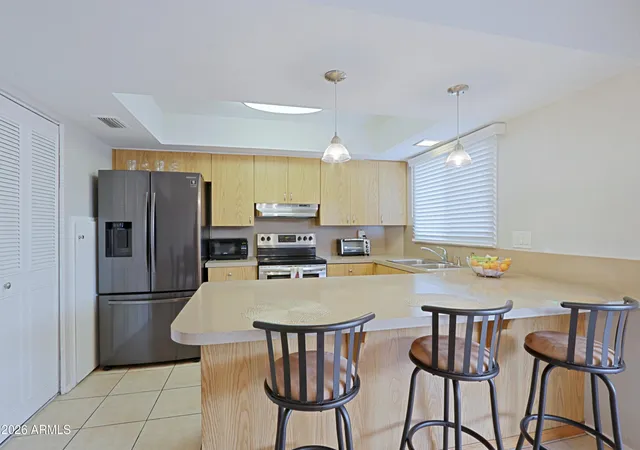 Photo 3 of Townhouse for sale at 1675 W Hazelwood St, Phoenix, AZ 85015 | MLS# 7072023 | Listing updated on 2026-09-08