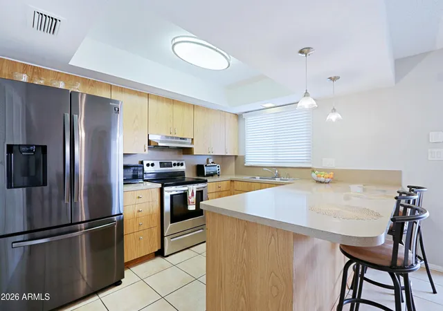 Photo 3 of Townhouse for sale at 1675 W Hazelwood St, Phoenix, AZ 85015 | MLS# 7072023 | Listing updated on 2026-09-08
