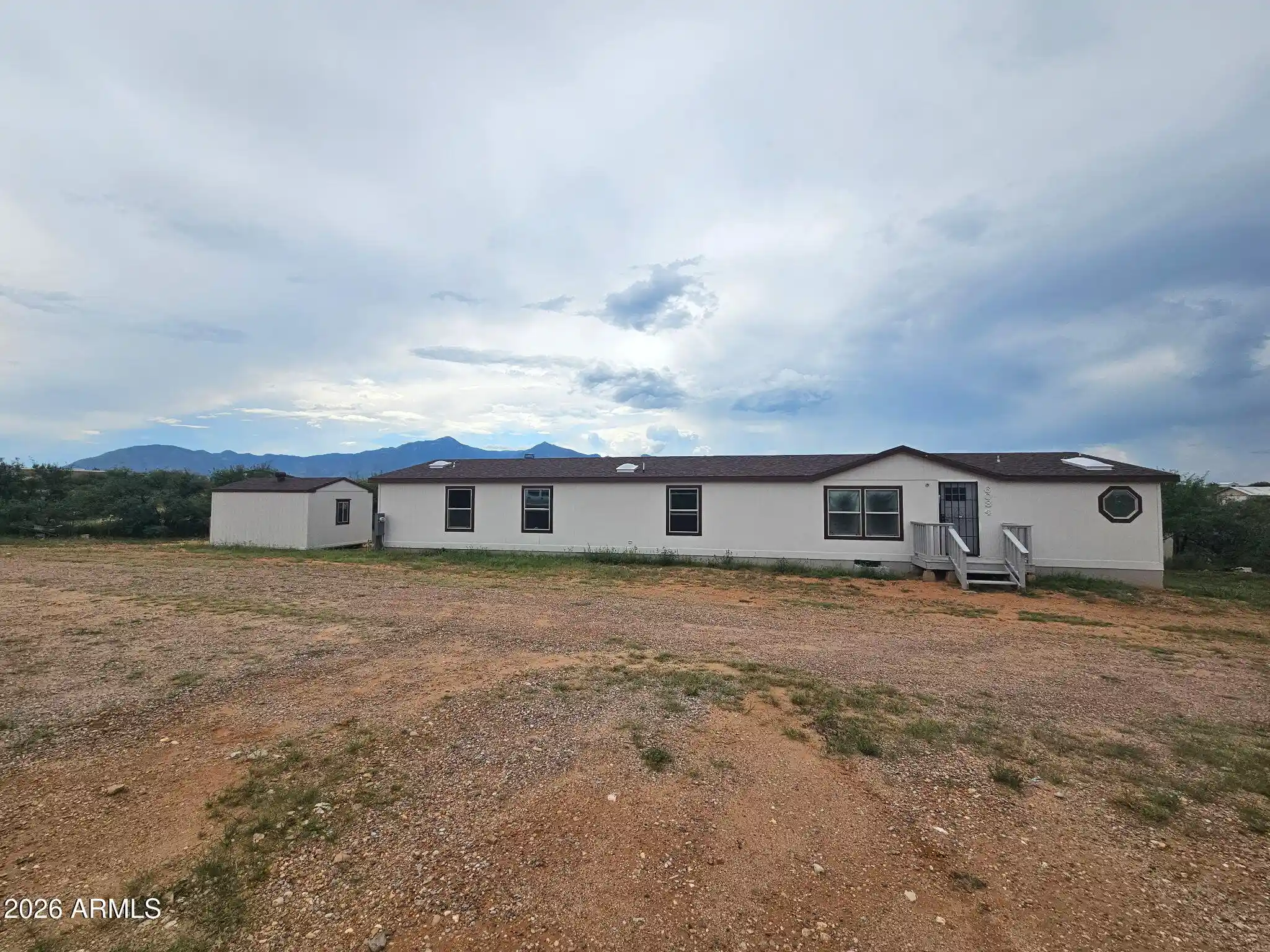 Photo 1 of Manufactured home for sale at 6084 S Nucci Ln, Hereford, AZ 85615 | MLS# 7080077 | Listing updated on 2026-10-19