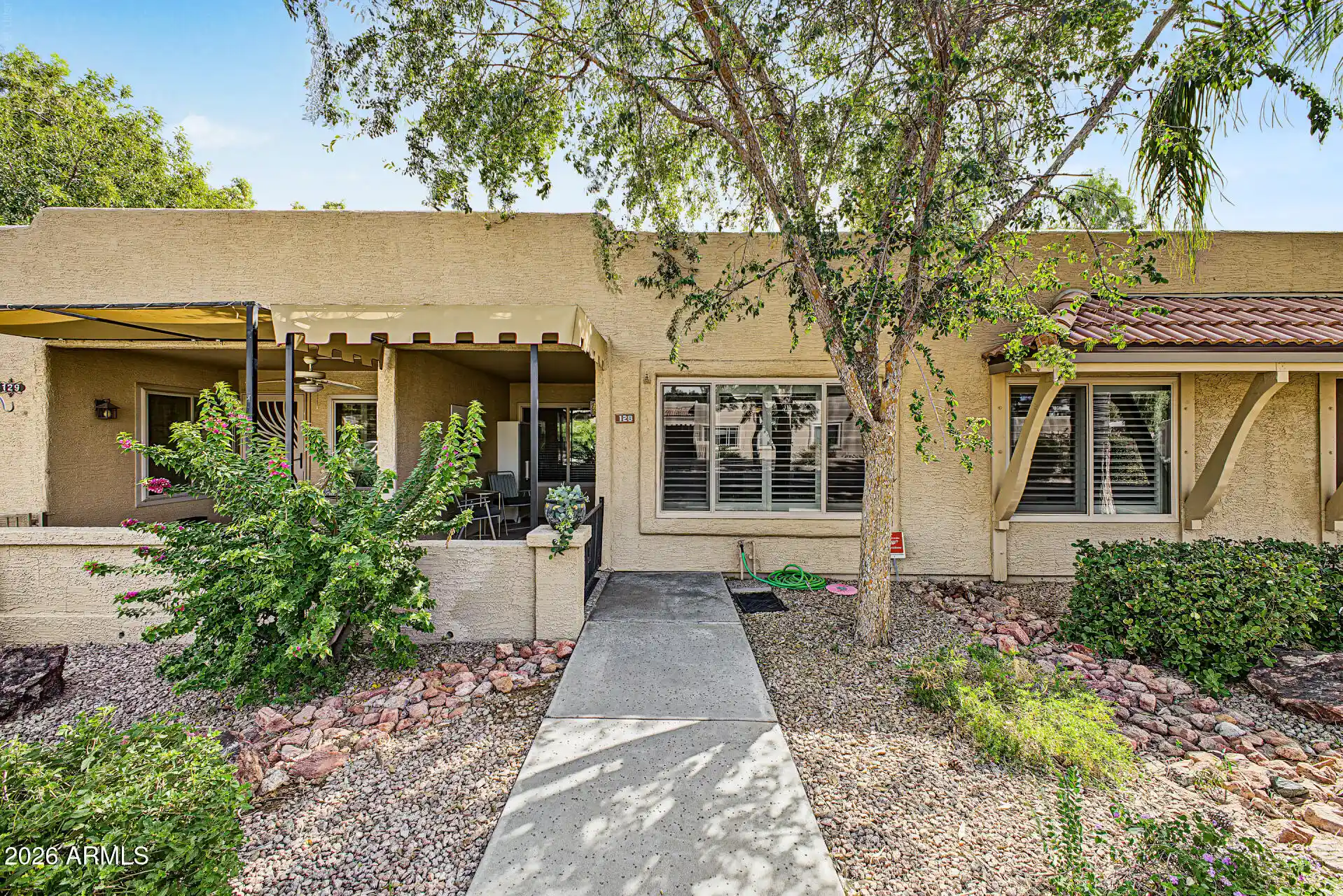 Photo 1 of Condo for sale at 14300 W Bell Rd #128, Surprise, AZ 85374 | MLS# 7093793 | Listing updated on 2026-10-27