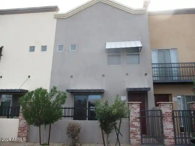 Photo 1 of Townhouse for sale at 1406 W Main St #140, Mesa, AZ 85201 | MLS# 7090581 | Listing updated on 2026-10-08