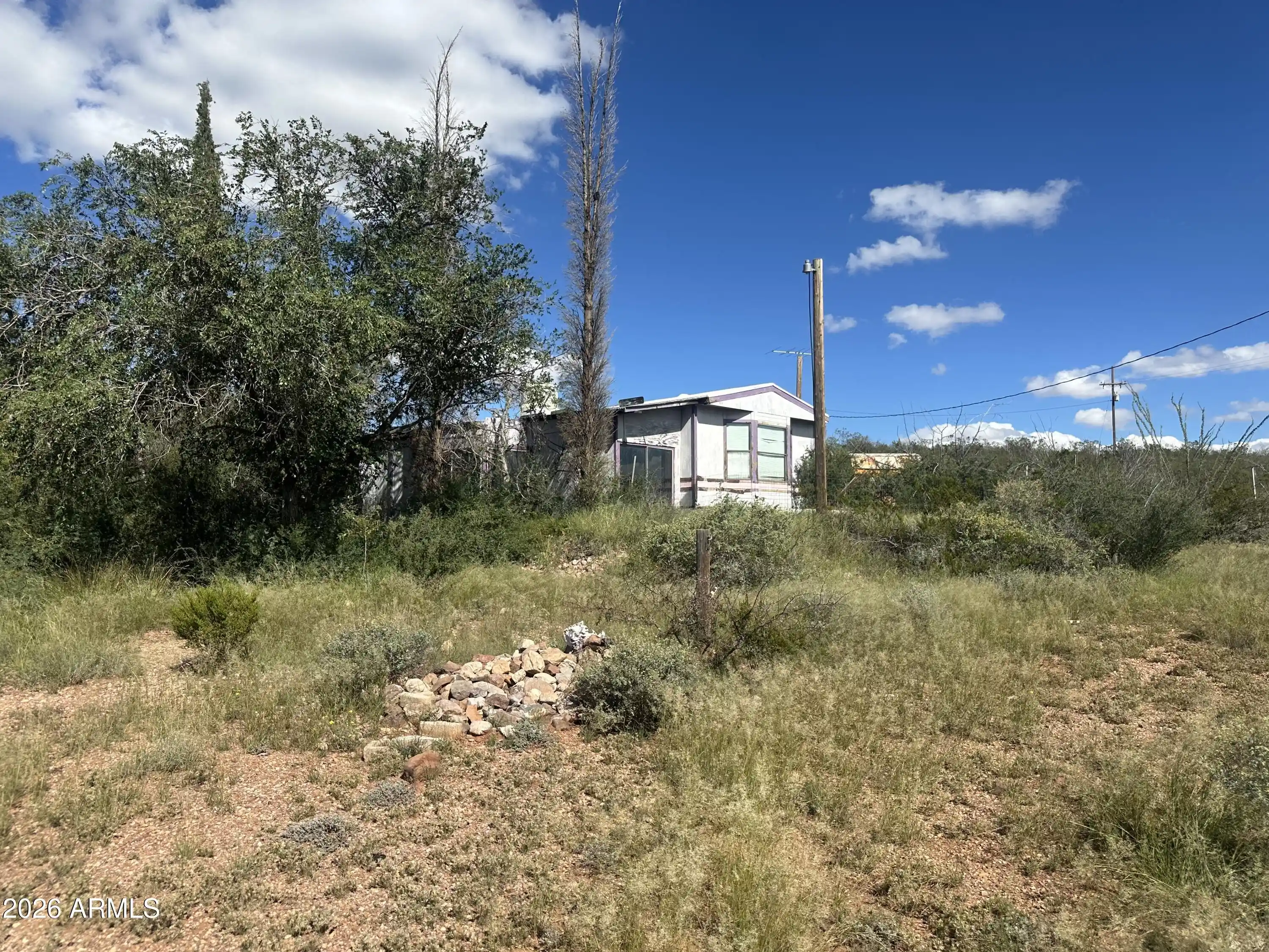 Photo 1 of Manufactured home for sale at 975 E Aviation Ave, Bisbee, AZ 85603 | MLS# 7091085 | Listing updated on 2026-10-09