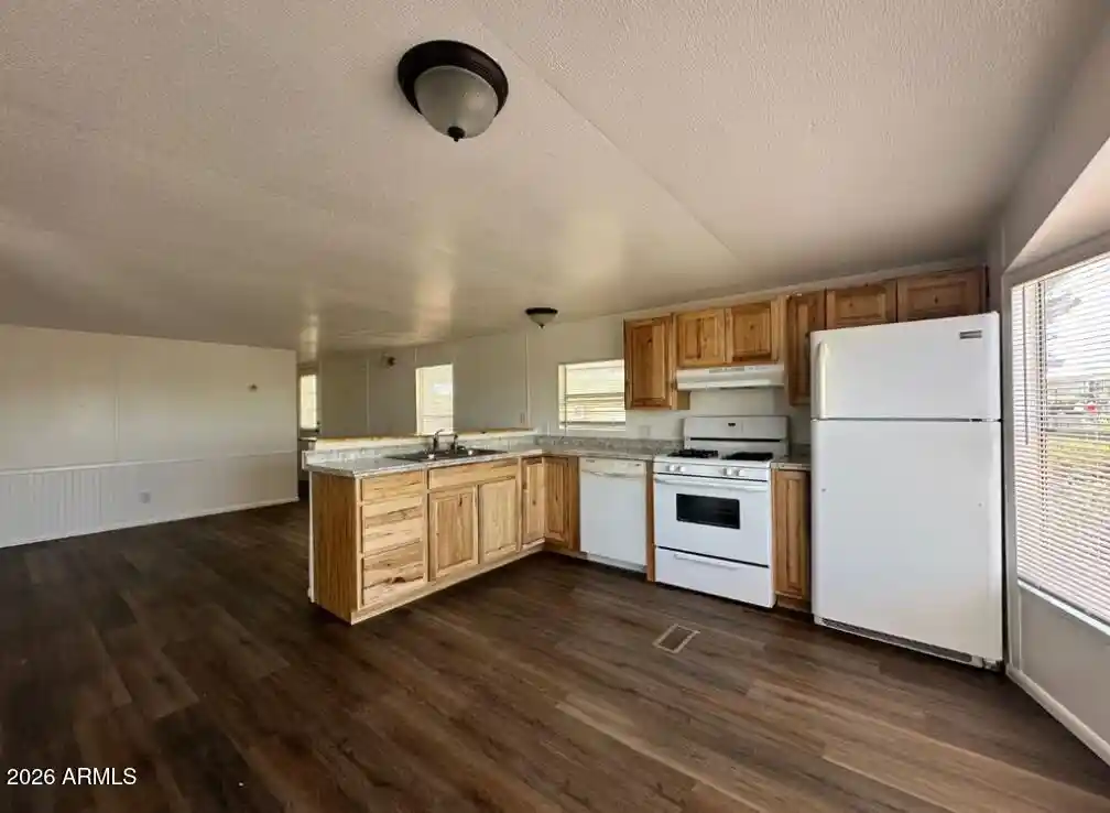 Photo 1 of Manufactured home for sale at 1855 W Wickenburg Way #141, Wickenburg, AZ 85390 | MLS# 7091591 | Listing updated on 2026-10-21