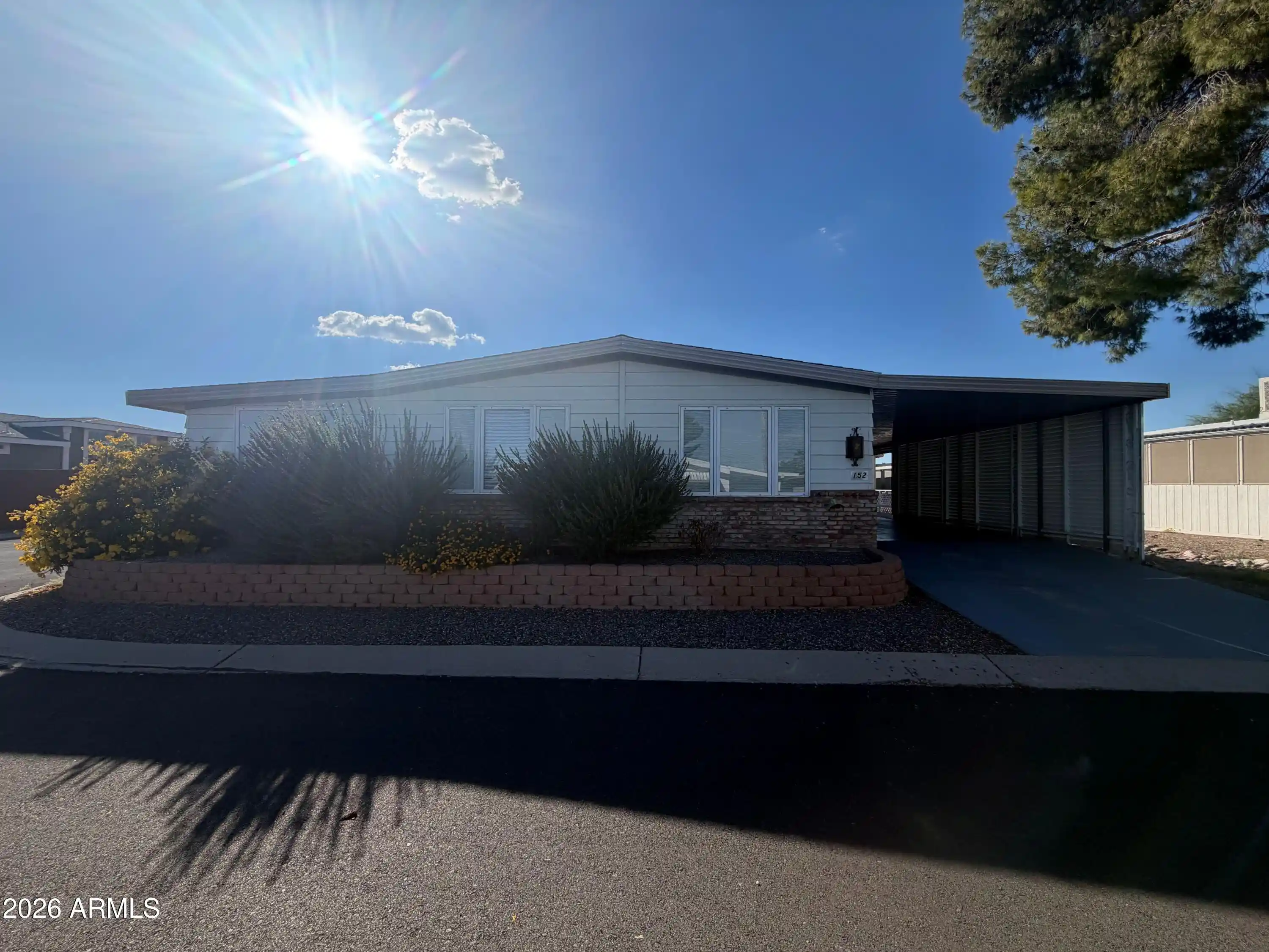 Photo 1 of Manufactured home for sale at 2501 W Wickenburg Way #152, Wickenburg, AZ 85390 | MLS# 7094581 | Listing updated on 2026-10-26