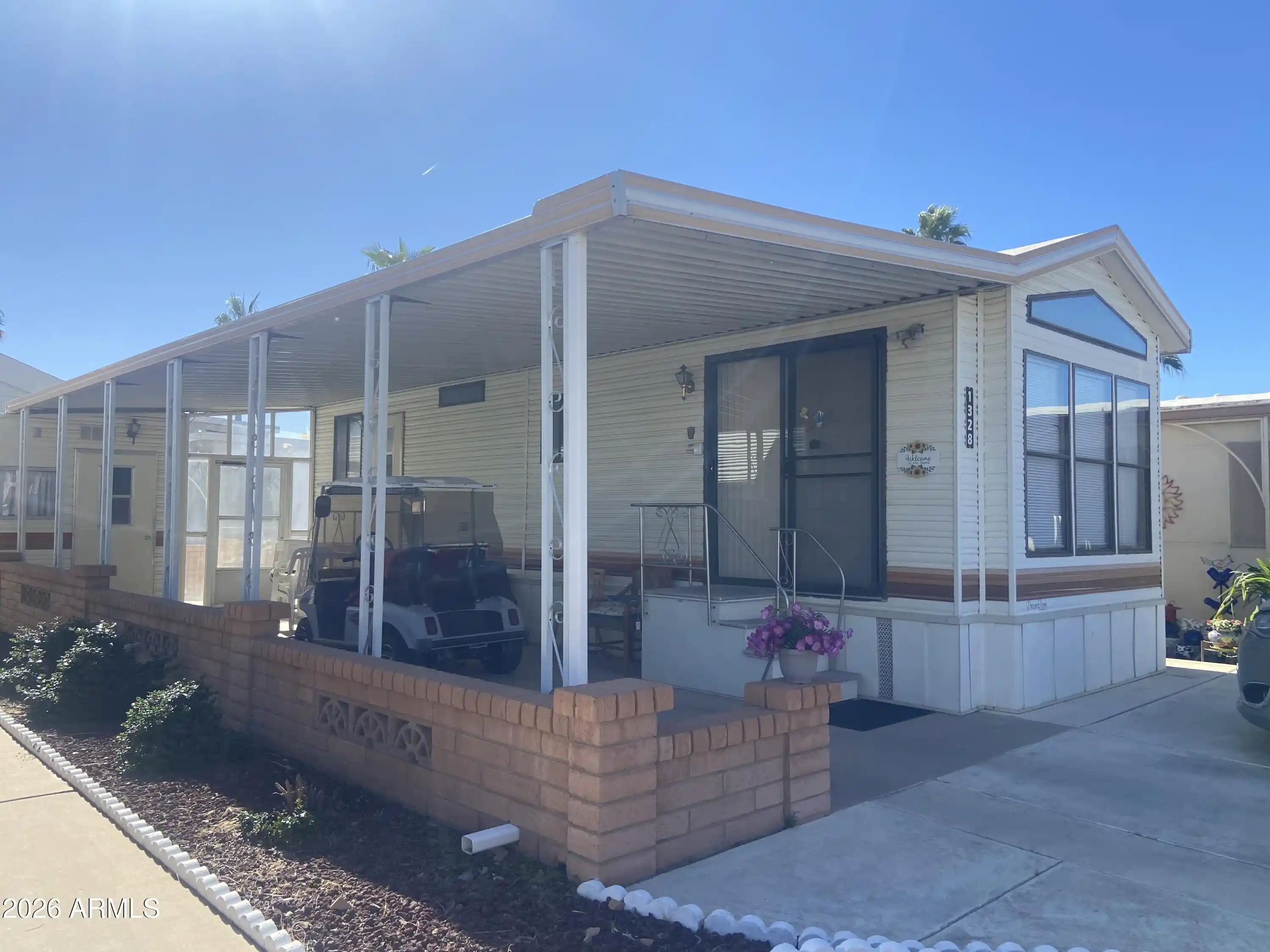 Photo 1 of Manufactured home for sale at 1328 W Inuit Ave, Apache Junction, AZ 85120 | MLS# 7097359 | Listing updated on 2026-10-23
