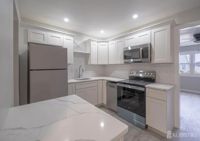 Photo 1 of Townhouse for sale at 11 Alabama Ct #500, Matawan, NJ 07747 | MLS# 2703636R | Listing updated on 2026-09-04