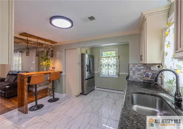 Photo 4 of Single family home for sale at 306 William St, Piscataway, NJ 08854 | MLS# 2660262M | Listing updated on 2025-10-24
