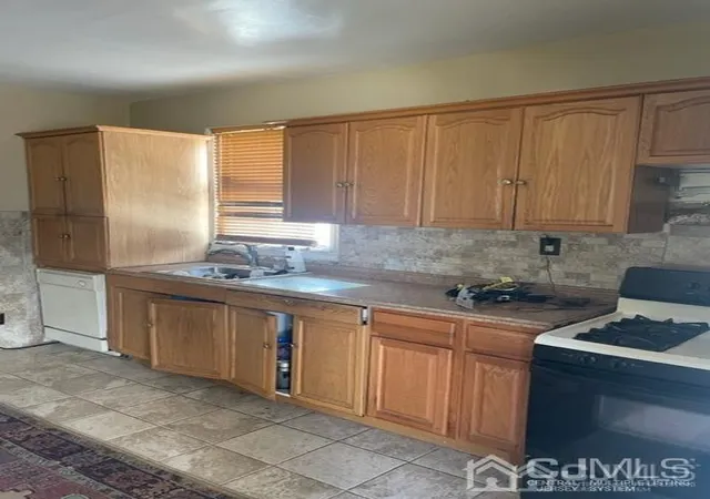 Photo 3 of Single family home for sale at 223 Prospect St, South River, NJ 08882 | MLS# 2301306R | Listing updated on 2023-09-15