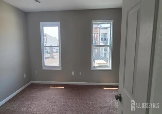 Photo 3 of Townhouse for sale at 110 Jefferson St, Perth Amboy, NJ 08861 | MLS# 2702977R | Listing updated on 2026-09-09