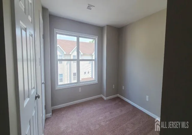 Photo 4 of Townhouse for sale at 110 Jefferson St, Perth Amboy, NJ 08861 | MLS# 2702977R | Listing updated on 2026-09-09