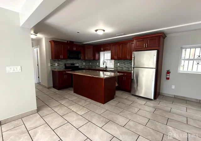 Photo 4 of Single family home for sale at 64 Montclair Ave, Newark, NJ 07104 | MLS# 2617515R | Listing updated on 2026-07-24