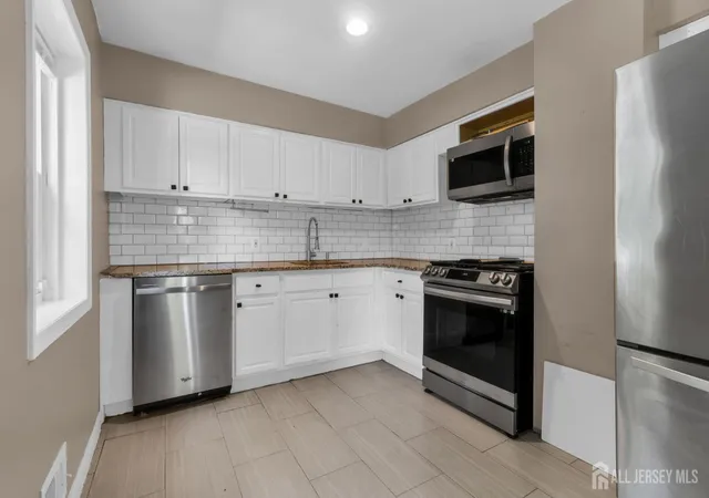 Photo 3 of Single family home for sale at 303 Stephenson Ave, Middlesex, NJ 08845 | MLS# 2616590R | Listing updated on 2026-08-16