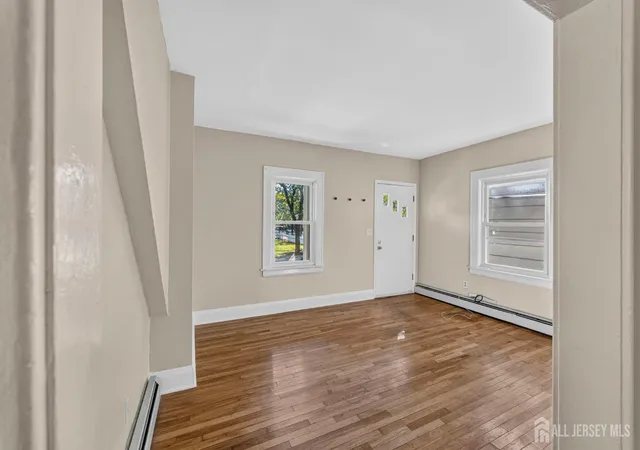 Photo 3 of Multi family home for sale at 32 S 7th Ave S, Highland Park, NJ 08904 | MLS# 2703271R | Listing updated on 2026-09-19