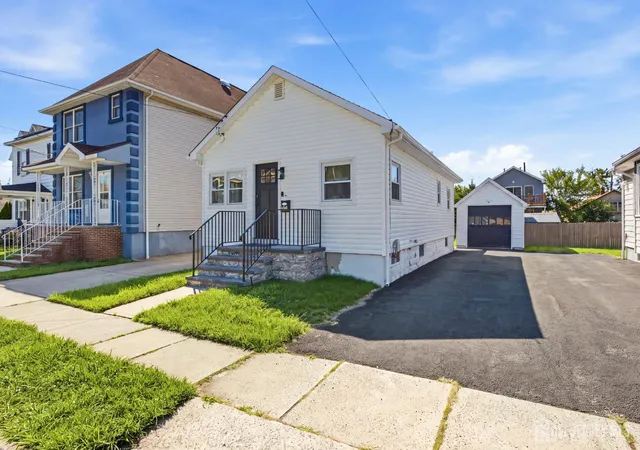 Photo 2 of Single family home for sale at 129 Pershing Ave, Iselin, NJ 08830 | MLS# 2703541R | Listing updated on 2026-09-29