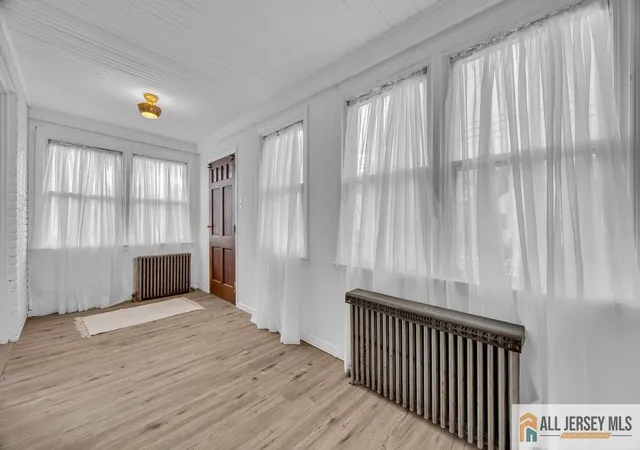 Photo 2 of Multi family home for sale at 34 Maple Ave, Edison, NJ 08837 | MLS# 2660877M | Listing updated on 2025-11-24