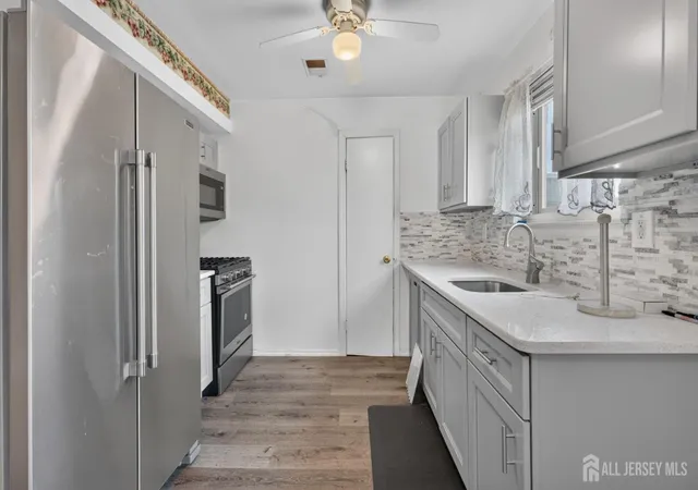 Photo 3 of Townhouse for sale at 809 N Oaks Blvd, North Brunswick, NJ 08902 | MLS# 2702138R | Listing updated on 2026-09-17
