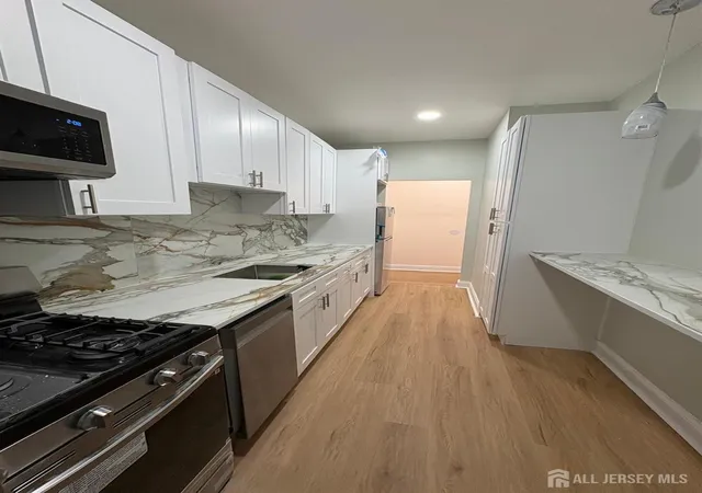 Photo 3 of Condo for sale at 194 Kensington Ave #303, Jersey City, NJ 07306 | MLS# 2701016R | Listing updated on 2026-09-03