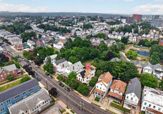 Photo 3 of Multi family home for sale at 81 Louis St, New Brunswick, NJ 08901 | MLS# 2701137R | Listing updated on 2026-08-06