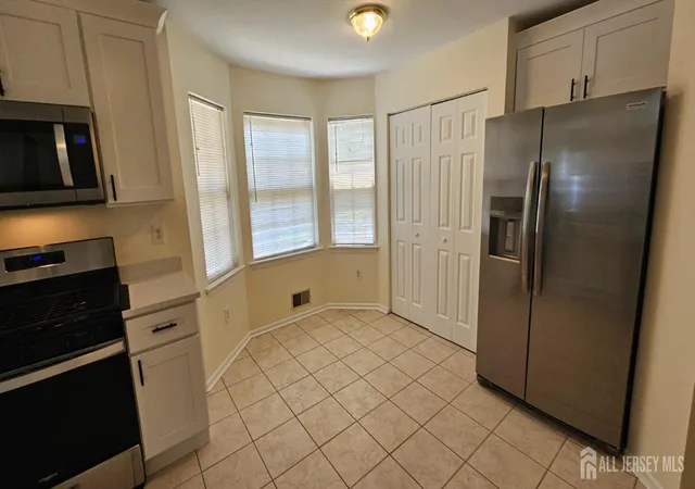 Photo 3 of Townhouse for sale at 405 Cobblestone Ct, Monmouth Junction, NJ 08852 | MLS# 2702800R | Listing updated on 2026-08-23