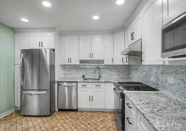 Photo 1 of Townhouse for sale at 1901 Deerfield Dr, Edison, NJ 08820 | MLS# 2703384R | Listing updated on 2026-09-24