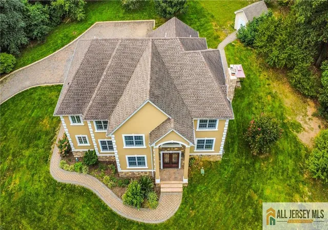 Photo 2 of Single family home for sale at 21 Fern Rd, East Brunswick, NJ 08816 | MLS# 2660584M | Listing updated on 2026-02-25