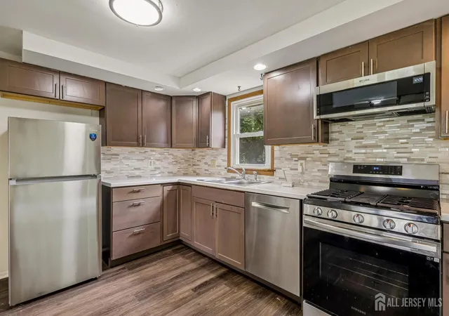 Photo 2 of Single family home for sale at 55 Jefferson Dr, Piscataway, NJ 08854 | MLS# 2703185R | Listing updated on 2026-09-23