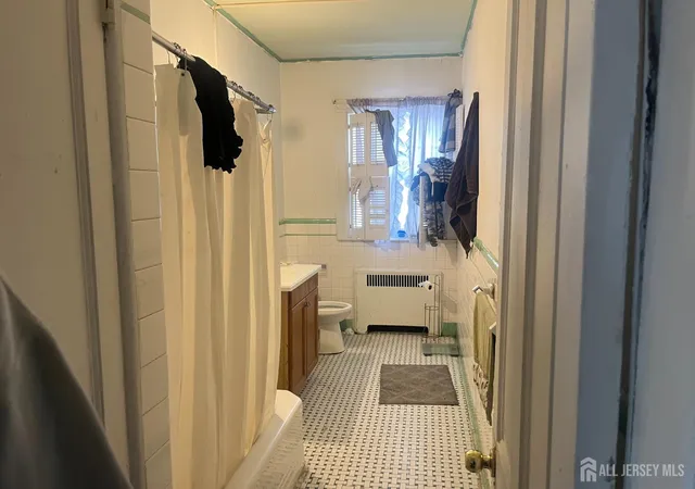 Photo 4 of Single family home for sale at 509 4th Avenue, Asbury Park, NJ 07712 | MLS# 2700002R | Listing updated on 2026-09-29