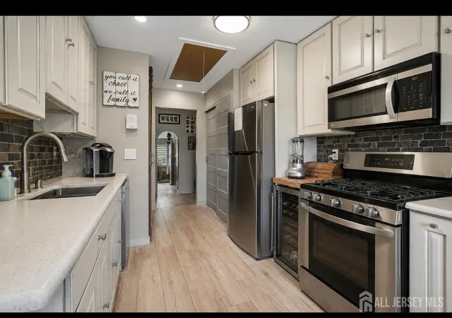 1st image of 307 Sharon Garden Ct, Woodbridge, NJ 07095 | MLS# 2702944R