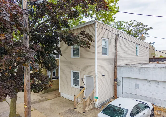 Photo 1 of Multi family home for sale at 409 Ogden Pl, Perth Amboy, NJ 08861 | MLS# 2616850R | Listing updated on 2026-09-23