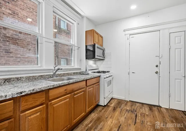 Photo 3 of House for sale at 94 Eaton Pl, East Orange, NJ 07017 | MLS# 2616283R | Listing updated on 2026-08-06