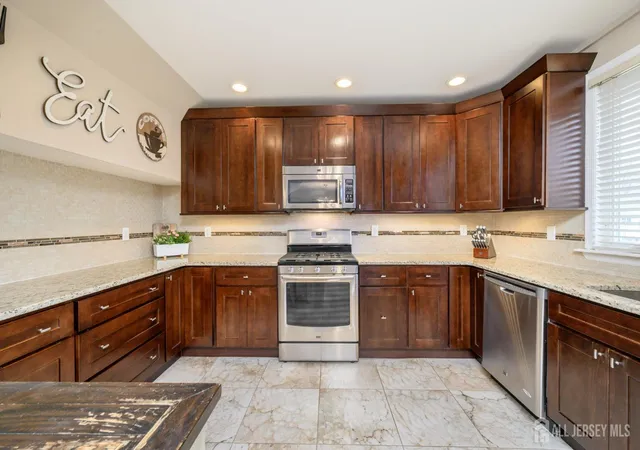 Photo 4 of Single family home for sale at 112 Mckinley Ave, Colonia, NJ 07067 | MLS# 2611977R | Listing updated on 2026-03-30