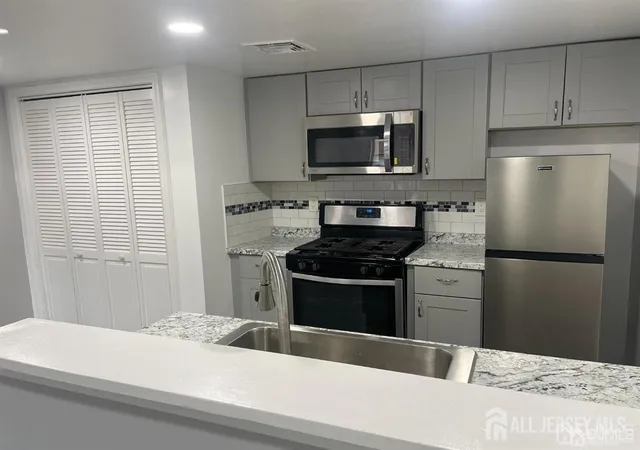 Photo 2 of Townhouse for sale at 23 Delavan Ct, New Brunswick, NJ 0890 | MLS# 2703571R | Listing updated on 2026-09-23