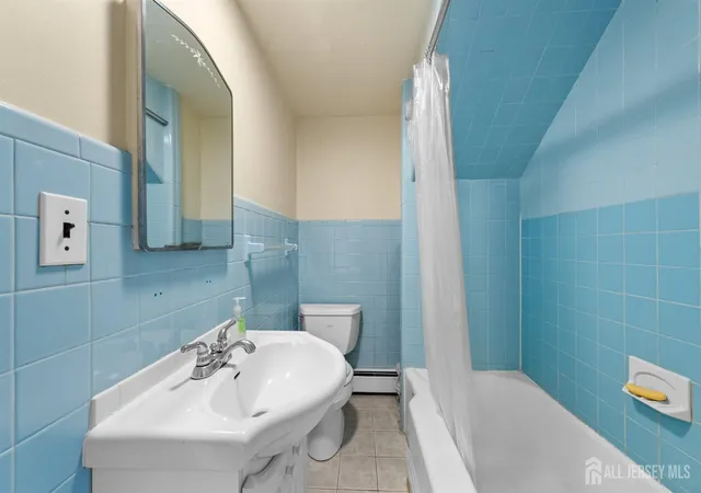 Photo 3 of House for sale at 973 Ellis Pkwy, Edison, NJ 08820 | MLS# 2610478R | Listing updated on 2026-02-20