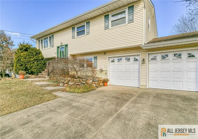 Photo 2 of Single family home for sale at 1209 Dakota Rd, North Brunswick, NJ 08902 | MLS# 2561046M | Listing updated on 2025-02-28